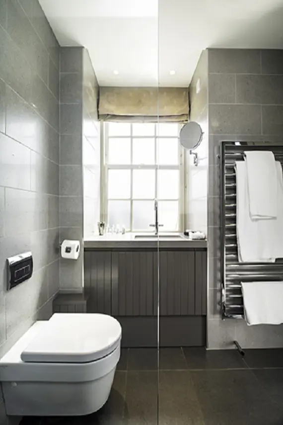 A modern bathroom in the studio apartment