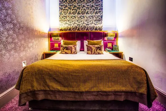 A grand, well decorated bedroom