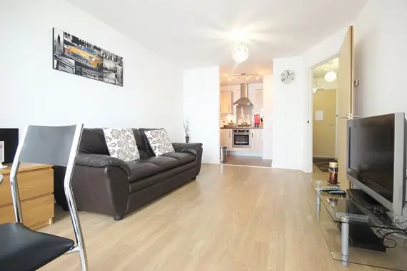 A comfortable, spacious living area in an executive one bedroom apartment