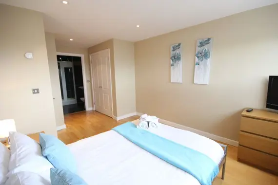 A spacious, cosy bedroom with en-suite in a two bedroom apartment