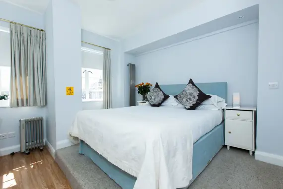 A comfortable, relaxing bedroom in a two bedroom apartment