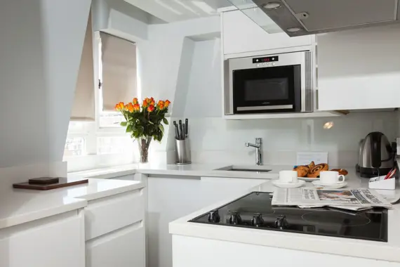 A bright, modern kitchen in a superior studio