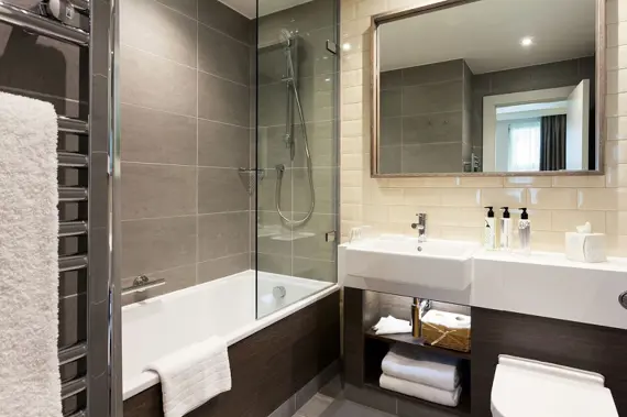A modern bathroom in a one bedroom apartment